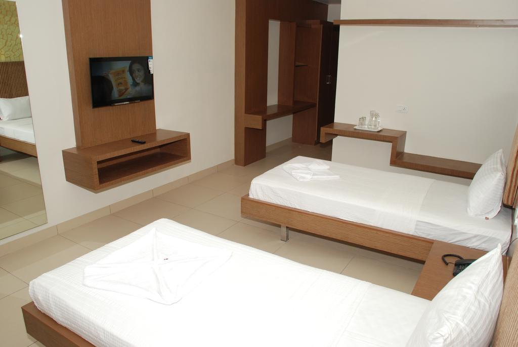 Hotel Pla Amrith Inn Tiruchirappalli Room photo